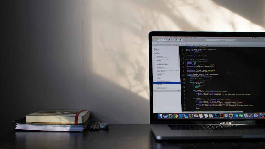 Laptop screen showing code, illustrating the prompt to paste into the coding agent